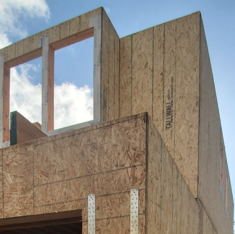 plywood walls on unfinished exterior of a home